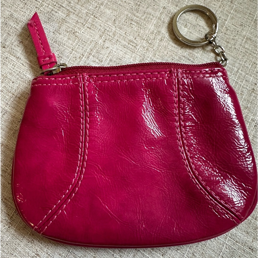 Coach pinkish red key ring purse.         Gently used.